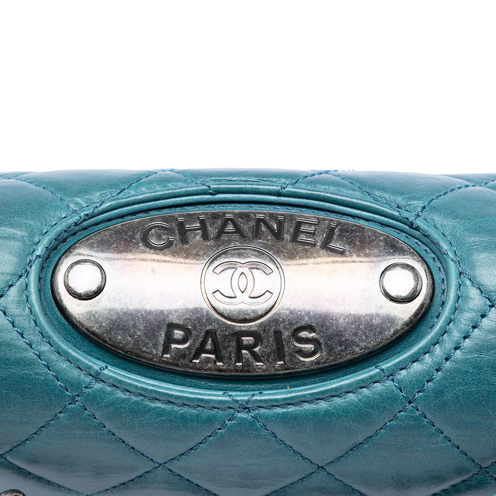 Chanel Quilted Calfskin Plaque Double Flap Bag