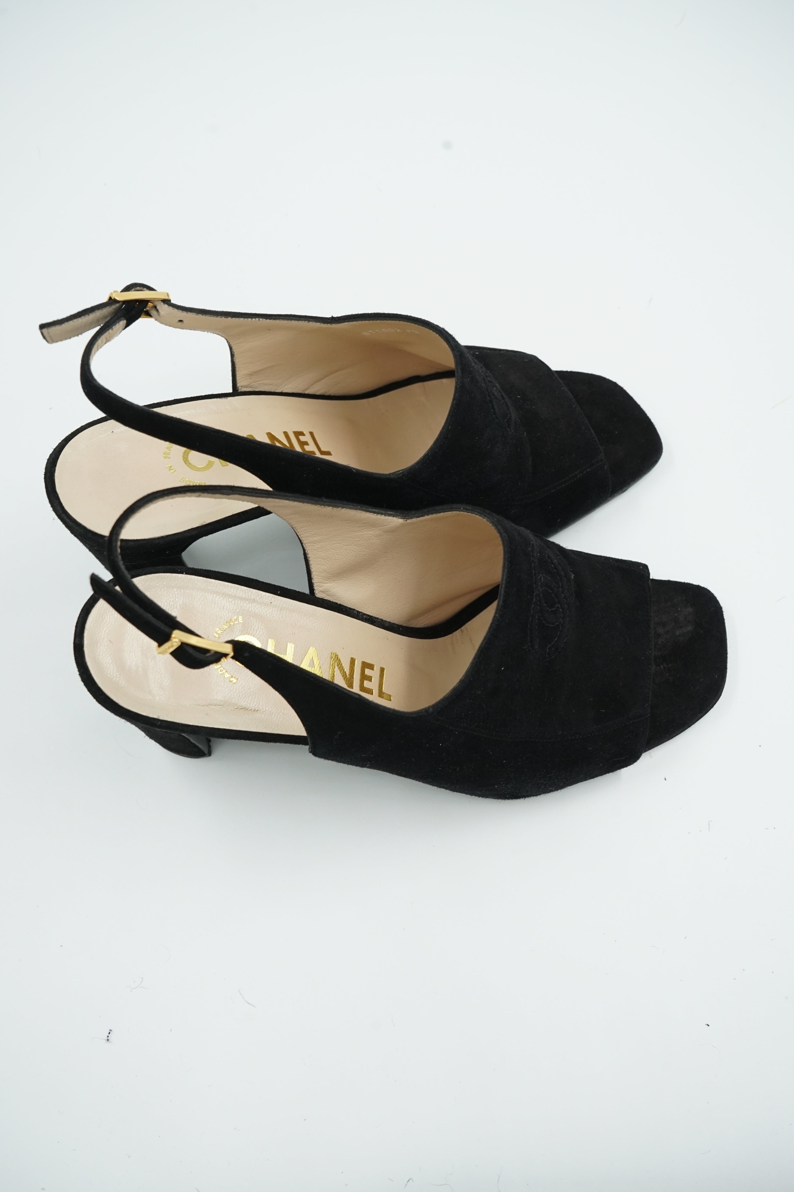 Chanel Heeled CC Embossed Logo Mules