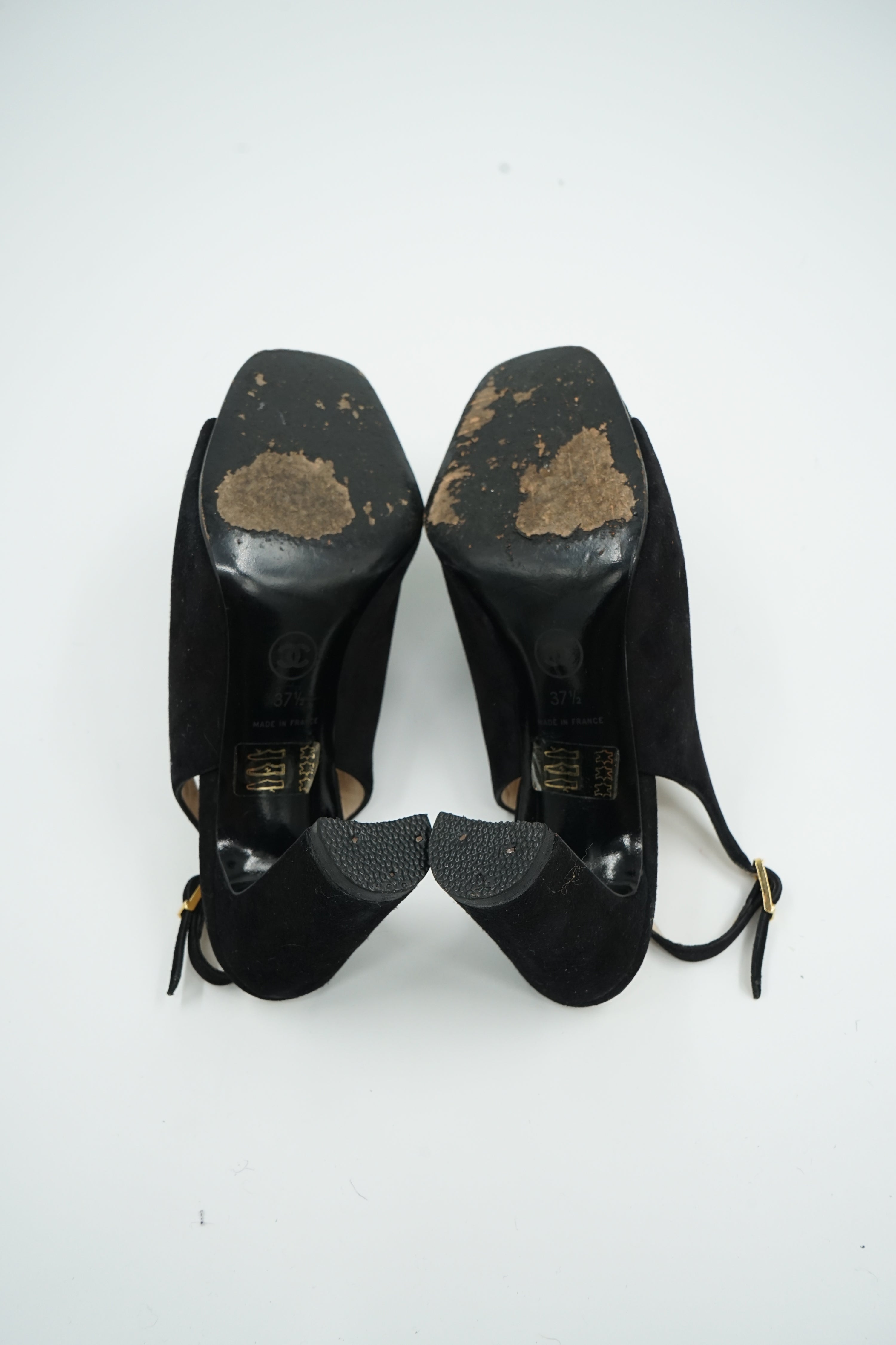Chanel Heeled CC Embossed Logo Mules