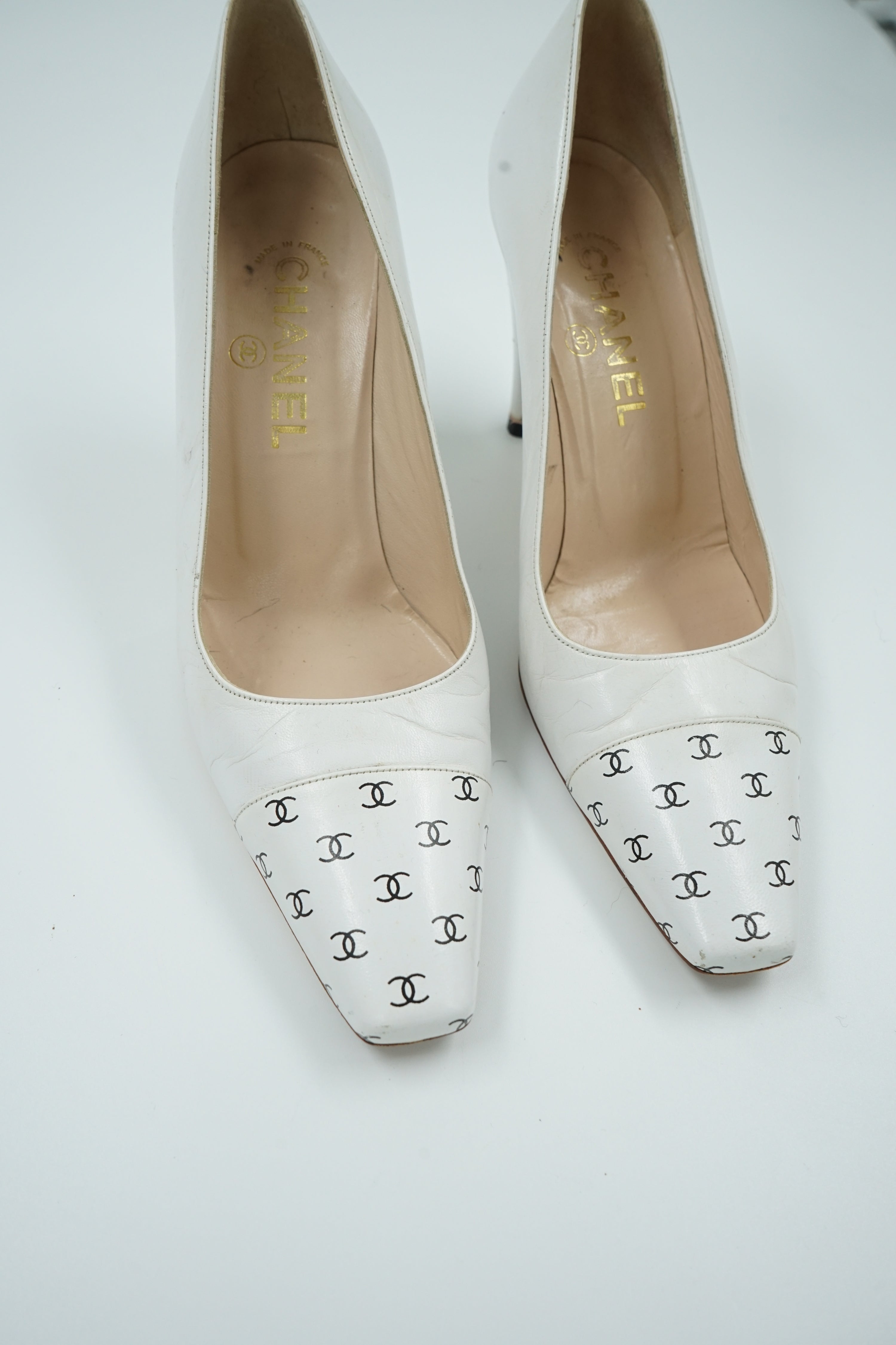 Chanel White Logo Cap Toe Pumps