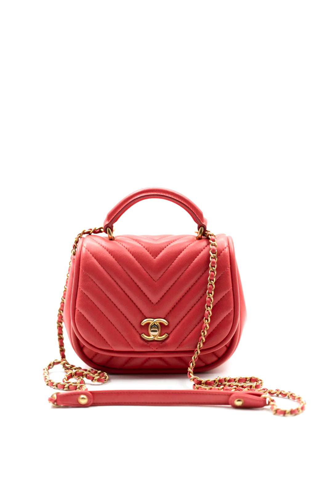 Chanel 2017 reversed chevron round flap bag in coral