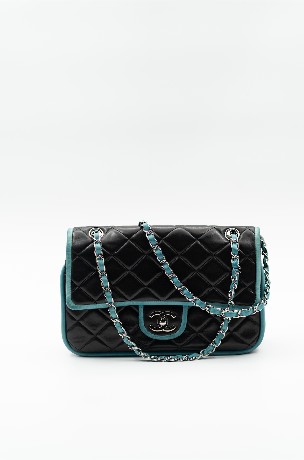 Chanel double flap bag with turquoise trim