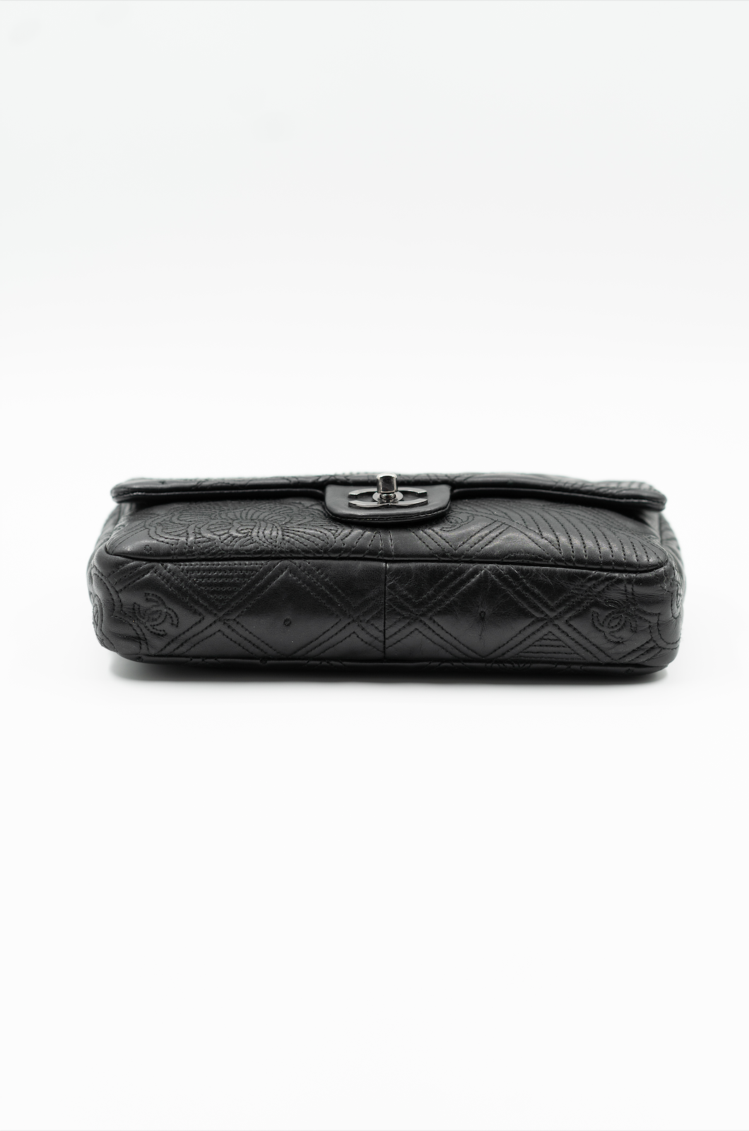 Chanel embossed single flap bag black