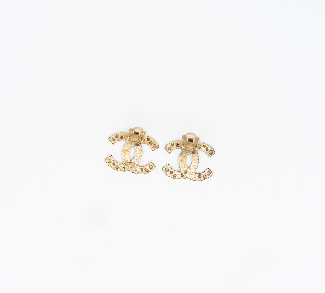 Chanel star cutout clip earrings