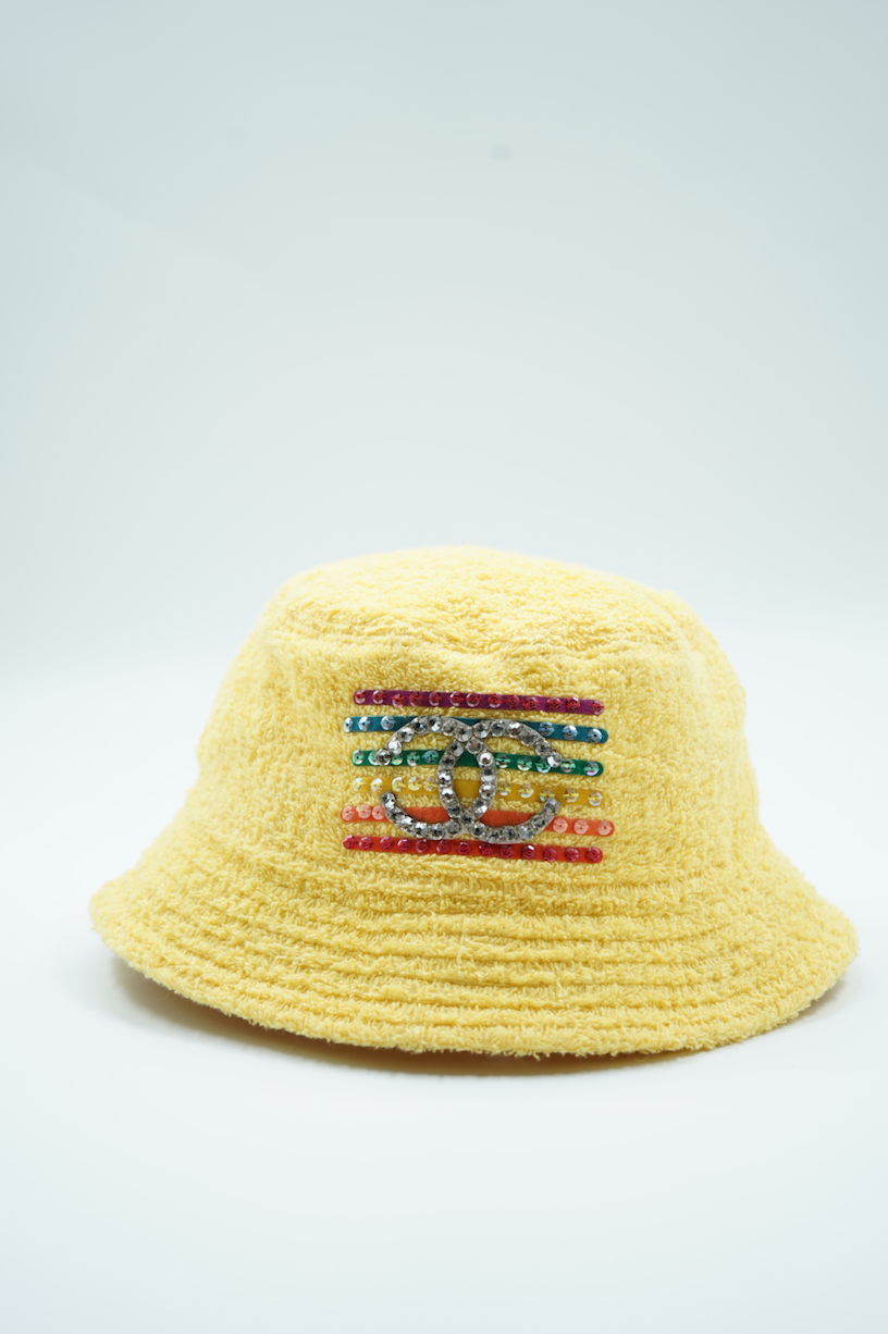 Chanel x Pharrell capsule collection bucket hat yellow