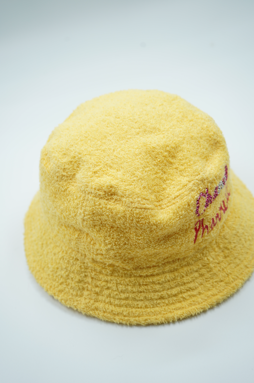 Chanel x Pharrell capsule collection bucket hat yellow