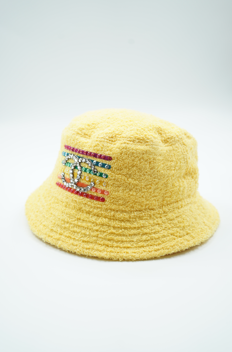 Chanel x Pharrell capsule collection bucket hat yellow